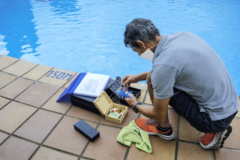 Checking a pool's chemical levels