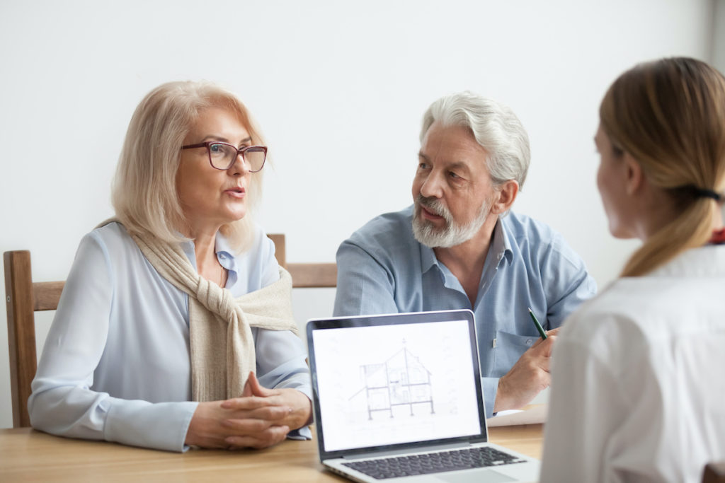 Older couple talking about renovations