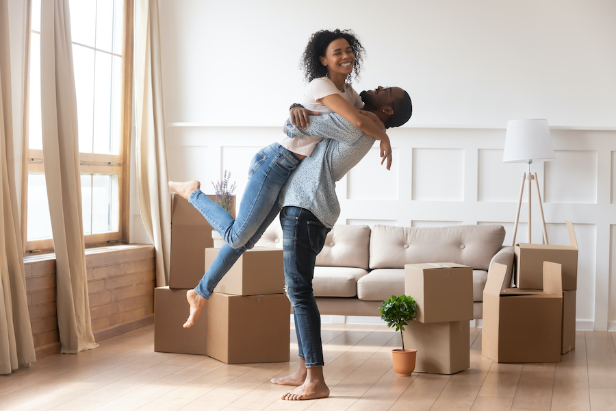 Millennial couple moving in