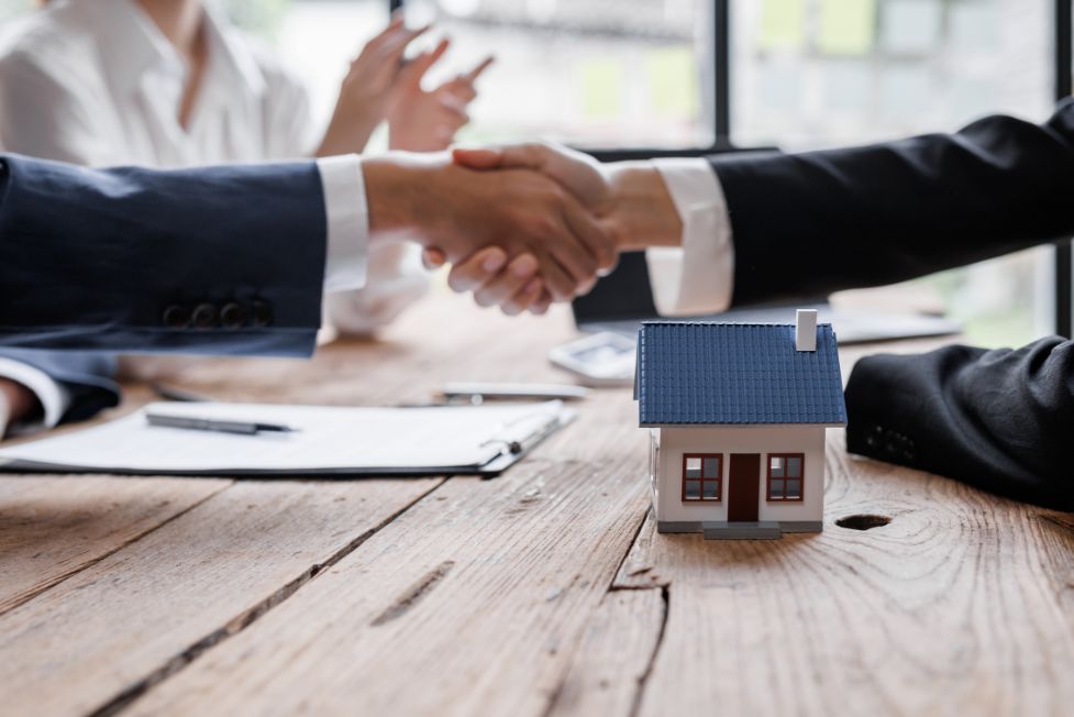 handshake over first-time homebuyer purchase