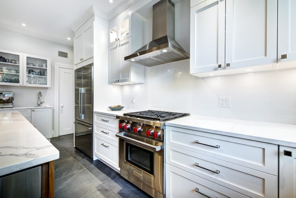 Home feature: modern white kitchen with updated appliances